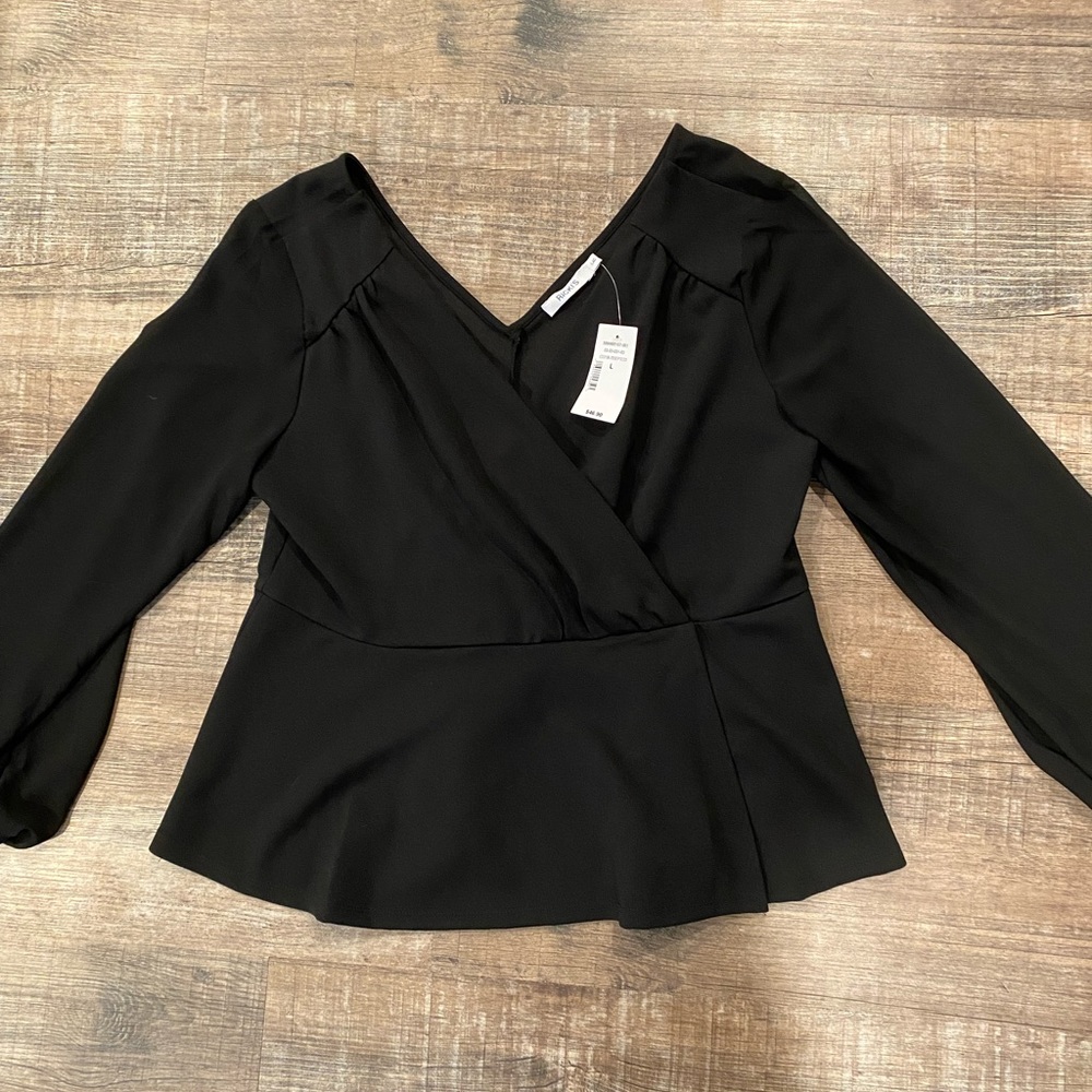 ✨2/$30✨NWT Ricki’s Blouse